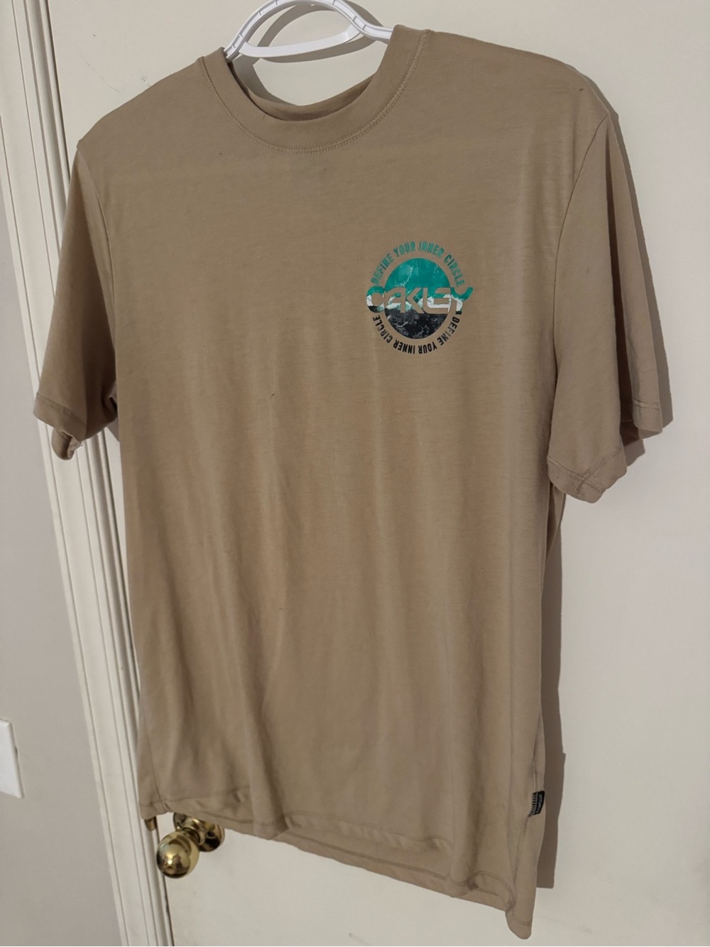 Oakley Men's Tan Short Sleeve Graphic Tee with Teal Accent medium